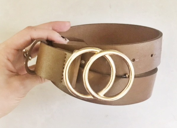 brown leather belt with gold accent