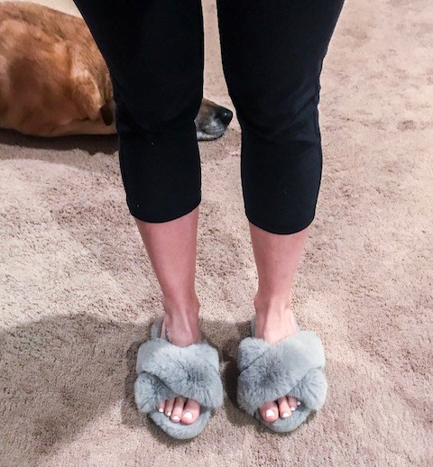 brittany wearing grey plush slippers